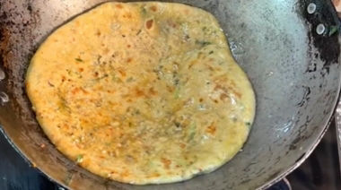 Crispy sprout paratha cooked in a kadhai and served hot